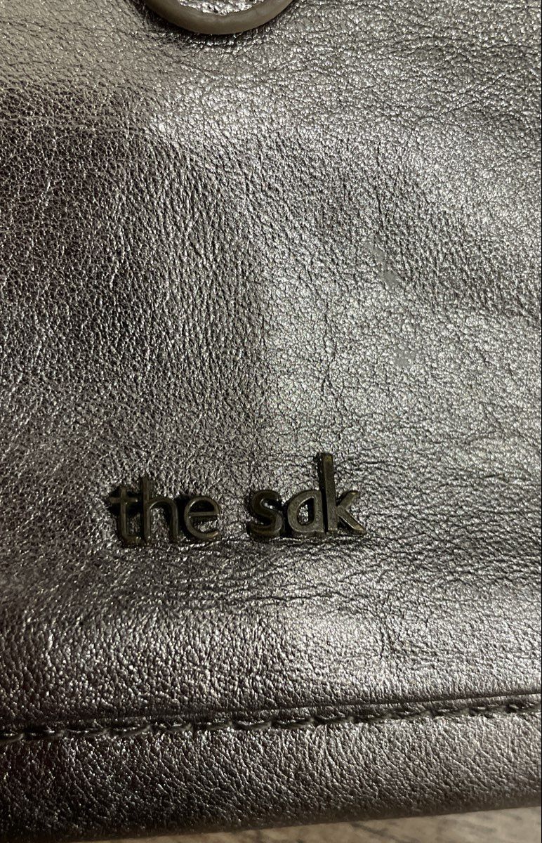 The Sak Silver Metallic Leather Crossbody Wallet on a String Mini Purse