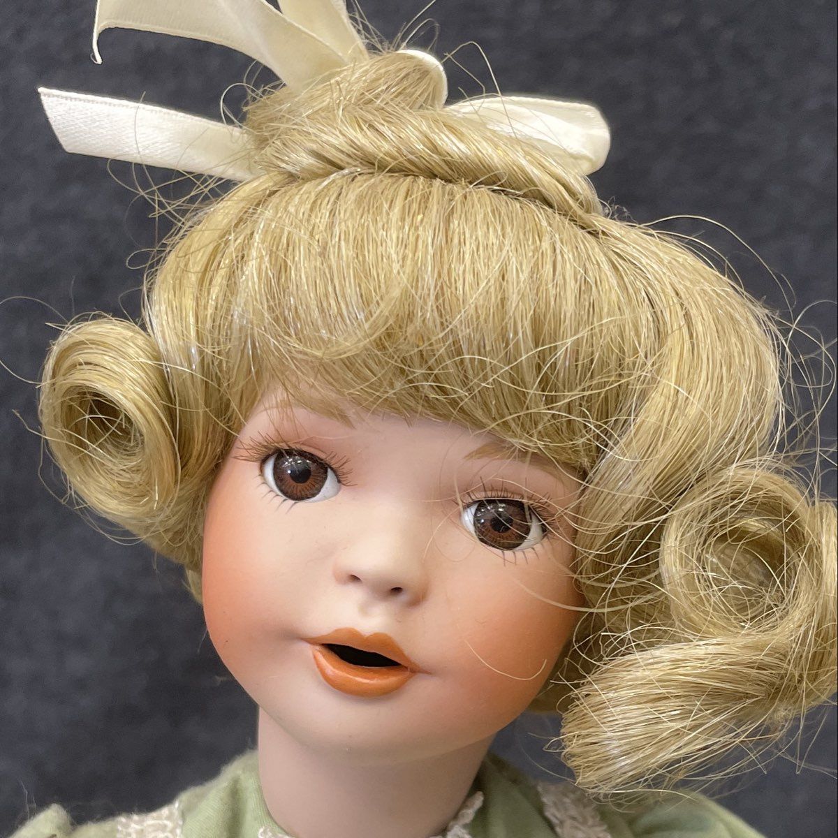Vintage Porcelain Doll 16" Blonde Hair Brown Eyes Green Dress Lace Trim