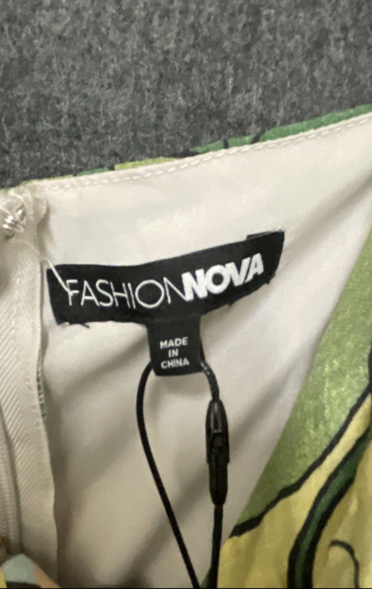 Fashion Nova Women's Kamiyah Printed Jumpsuit Green Abstract Smocked NWT Sz 2X