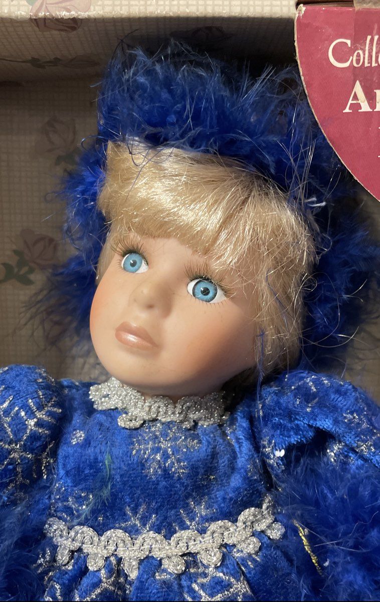 Vintage Collector's Choice Bisque Porcelain Musical Doll Animated Blue Winter