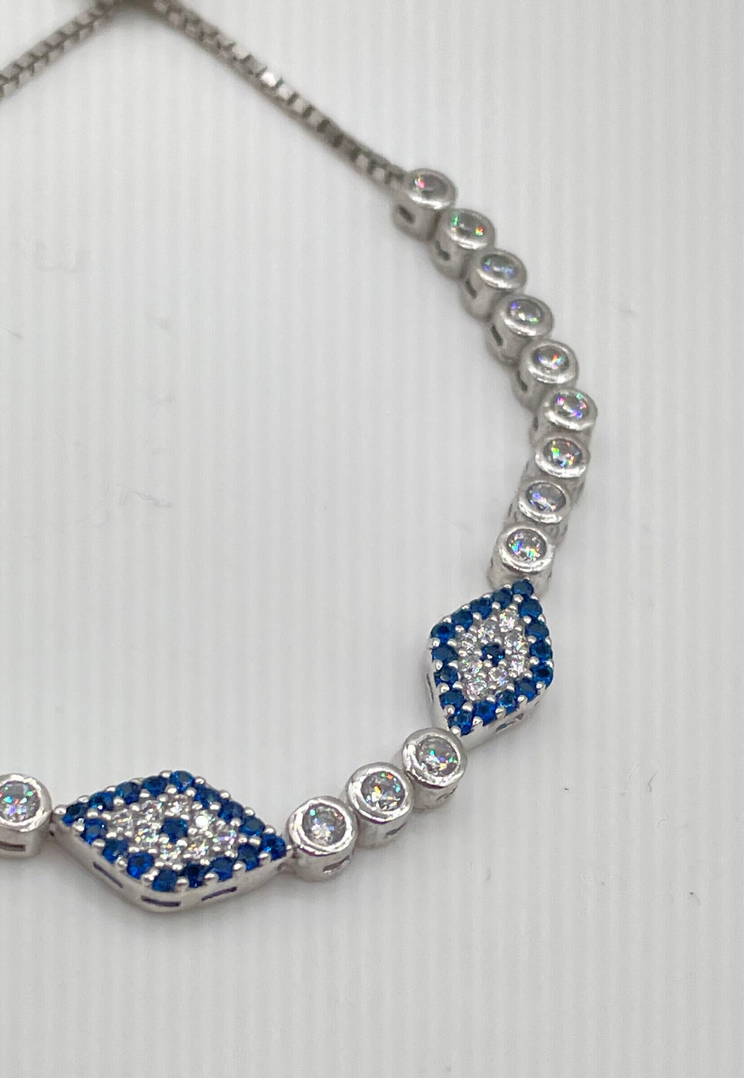 925 Sterling Silver Clear CZ Blue Sapphire Evil Eye Bolo Tennis Bracelet 8.6g