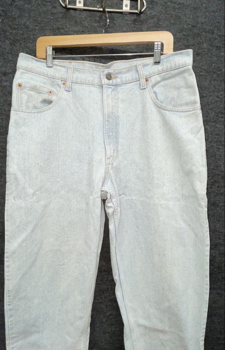 Vintage 90s Levi's Men's 560 Loose Fit Tapered Light Wash Jeans USA Made 36x34