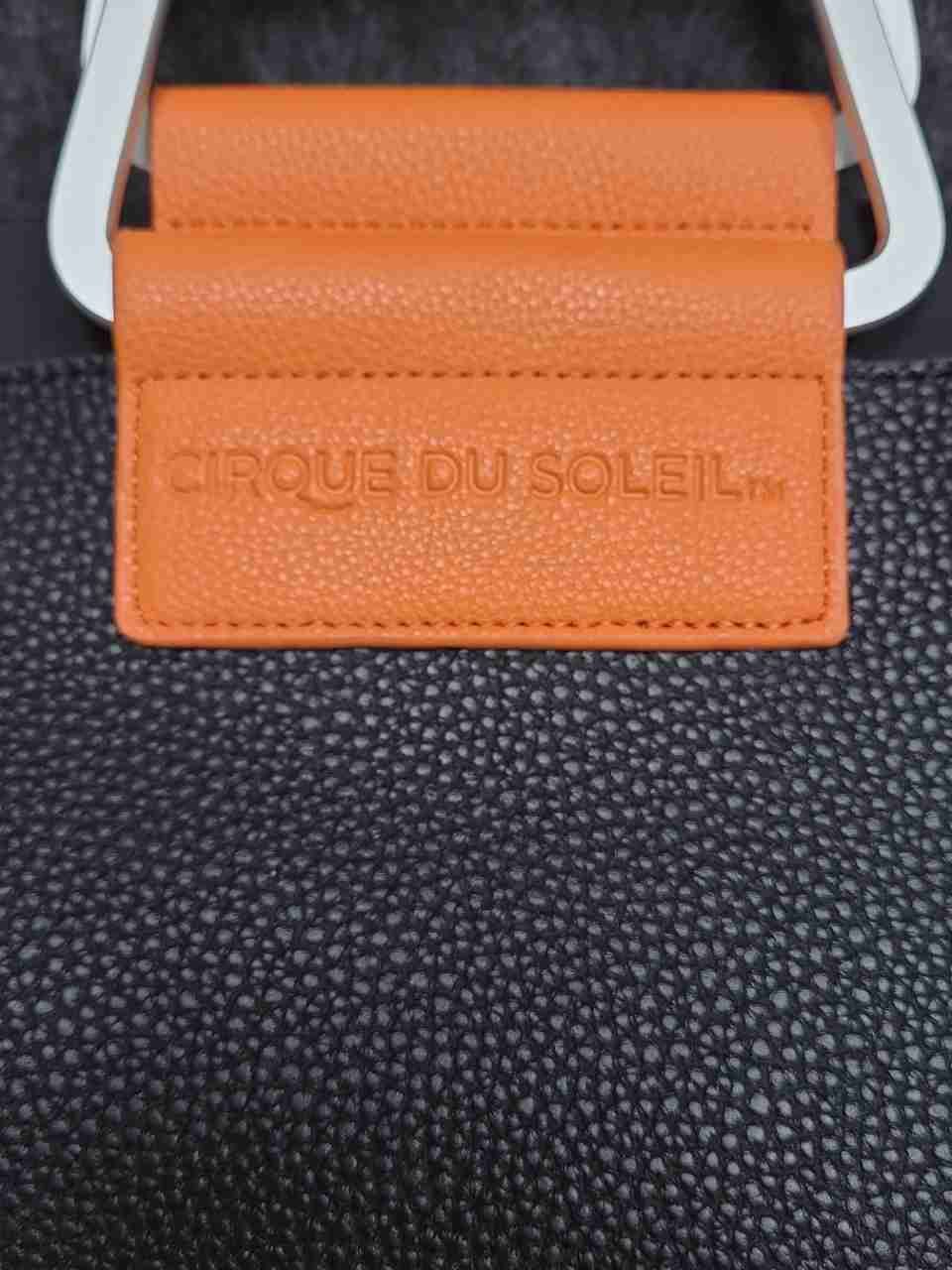Cirque du Soleil Black Pebbled Tote Bag Orange Accents Chevron Crossbody Strap