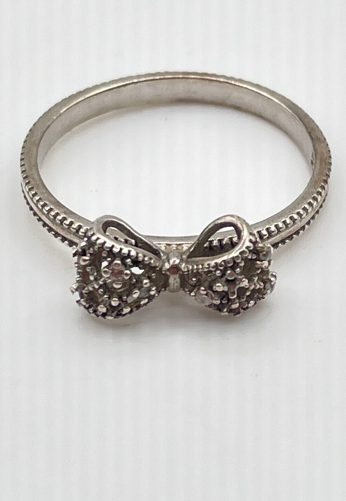 925 Sterling Silver CZ Accent Bow Ribbon Ring 2.1g *Missing Stones*