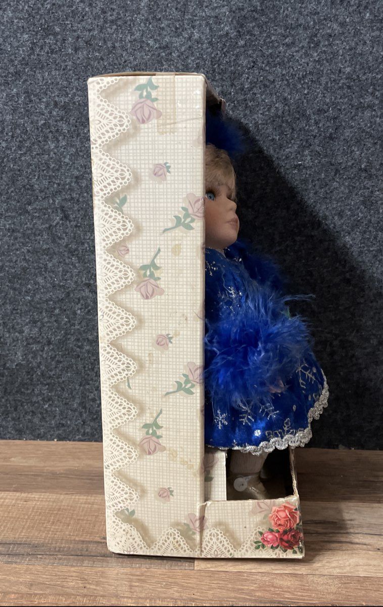 Vintage Collector's Choice Bisque Porcelain Musical Doll Animated Blue Winter