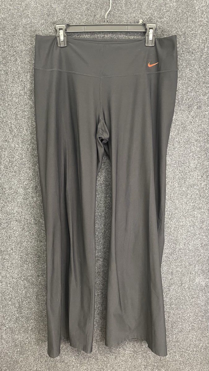 Nike Women's Dri-FIT Yoga Pants Black Orange Flare Leg Performance Sz L