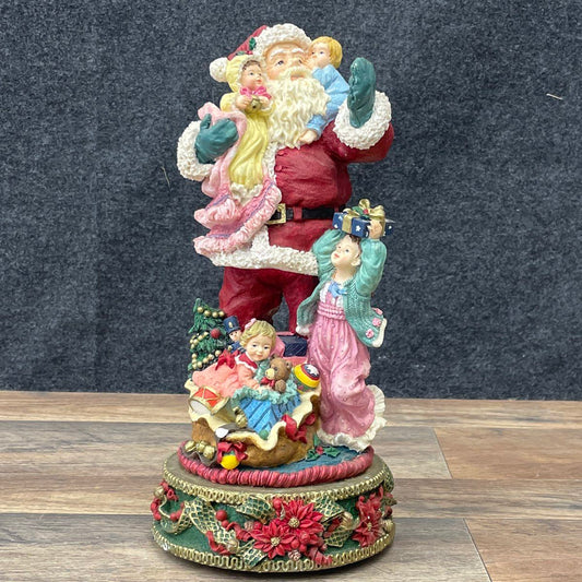 Vintage Musical Santa Claus Resin Figurine Plays "Santa Claus is Coming to Town"