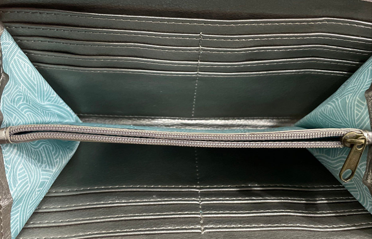 The Sak Silver Metallic Leather Crossbody Wallet on a String Mini Purse