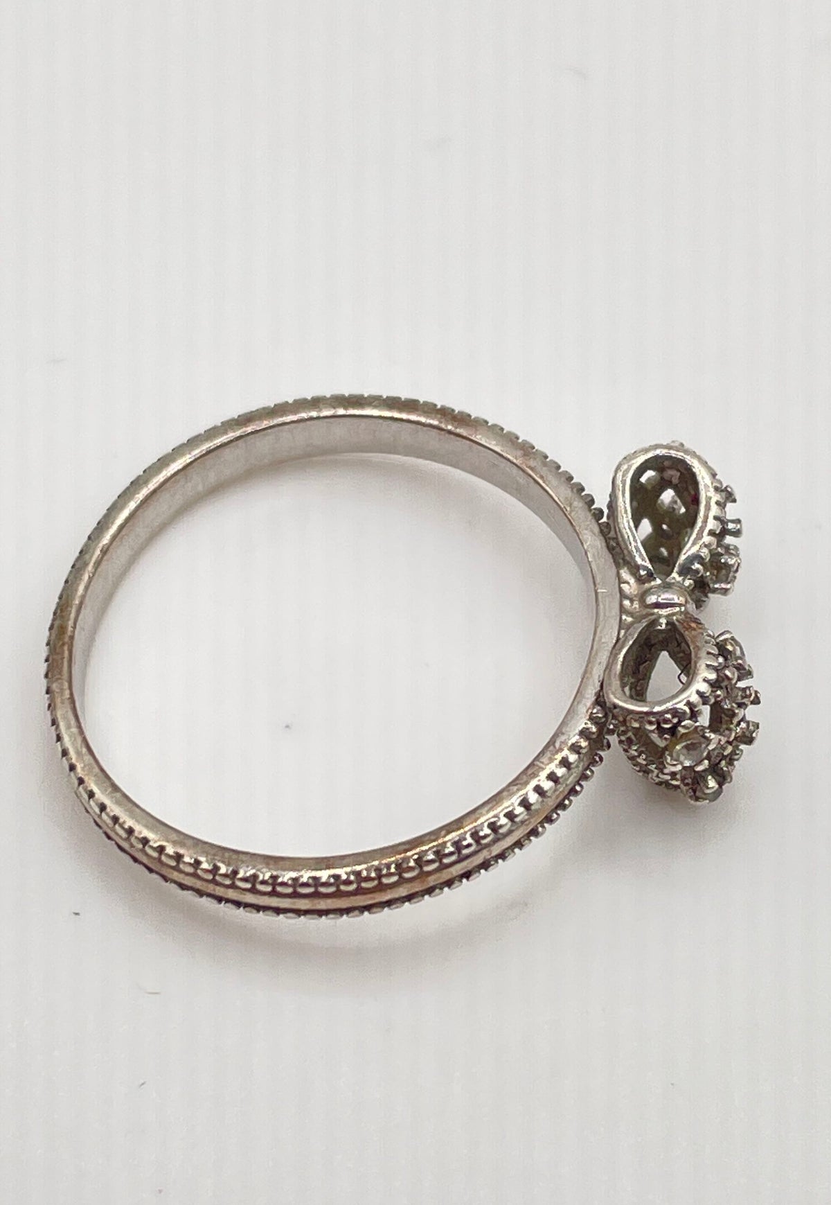 925 Sterling Silver CZ Accent Bow Ribbon Ring 2.1g *Missing Stones*