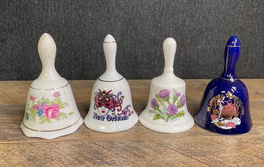 Lot of 4 Vintage Porcelain Bells New Orleans St Thomas Thistle Floral Souvenir