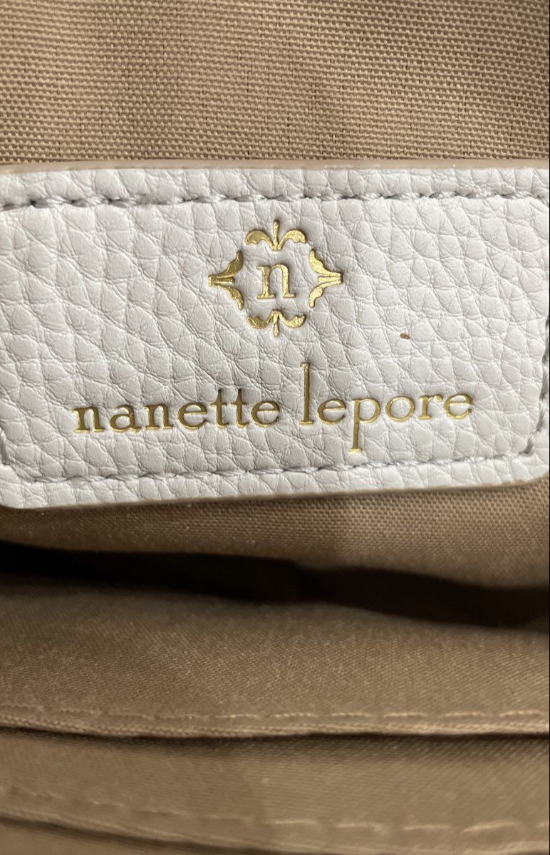Nanette Lepore White Leather Wristlet Clutch Pouch Bangle Handle Pom Pom Tassel