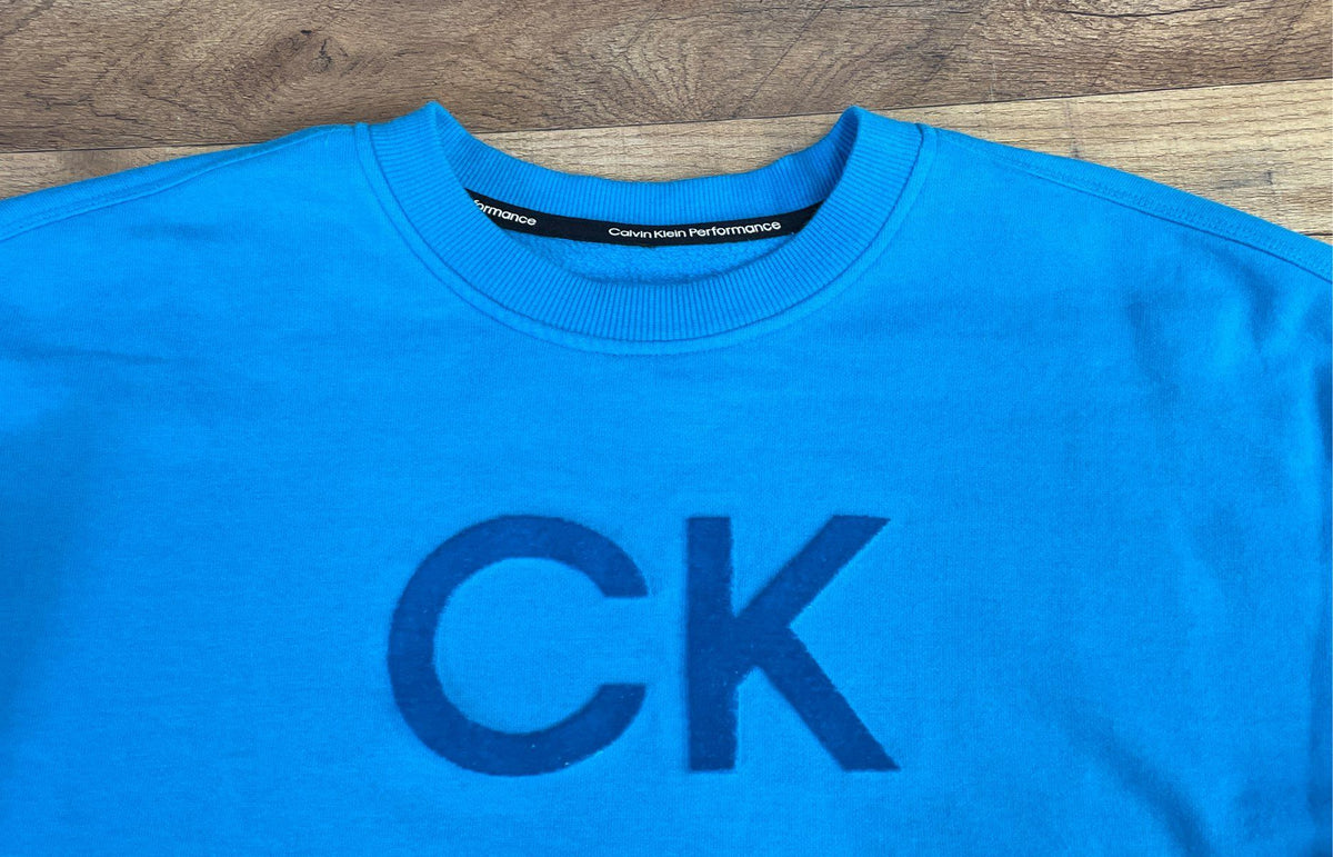Calvin Klein Performance Women's Blue Cropped Pullover Textured Logo Sweatshirt