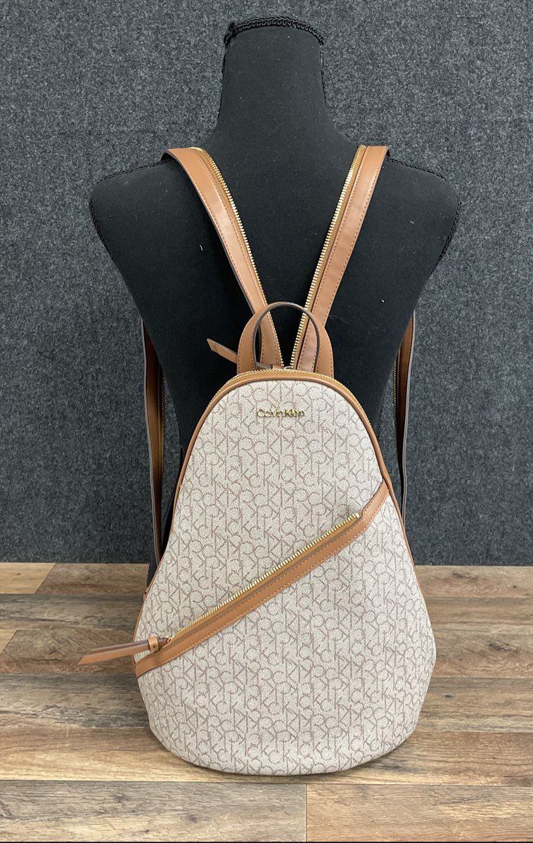 Calvin Klein Beige Tan Monogram Logo Convertible Backpack Sling Bag Gold