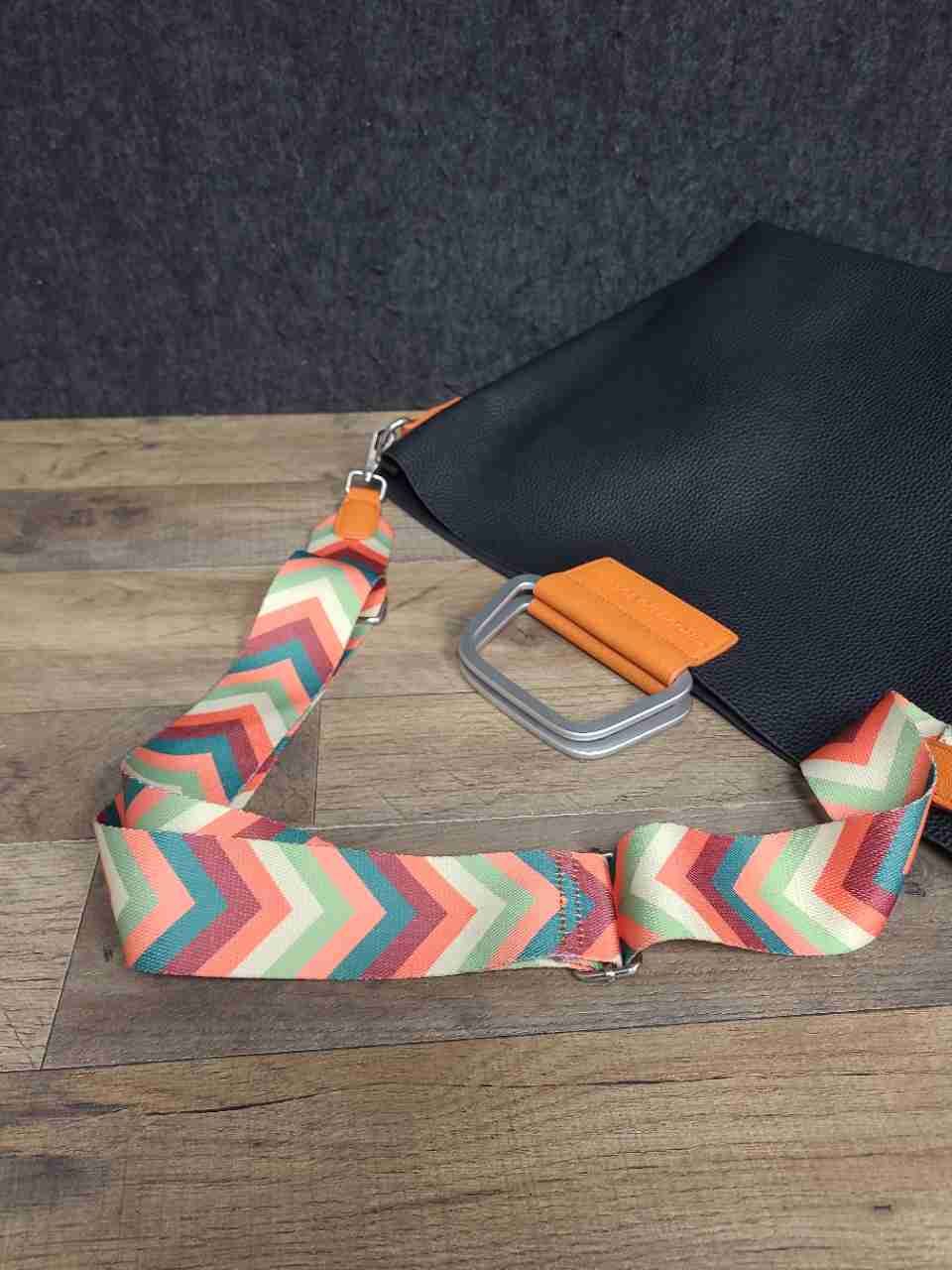 Cirque du Soleil Black Pebbled Tote Bag Orange Accents Chevron Crossbody Strap